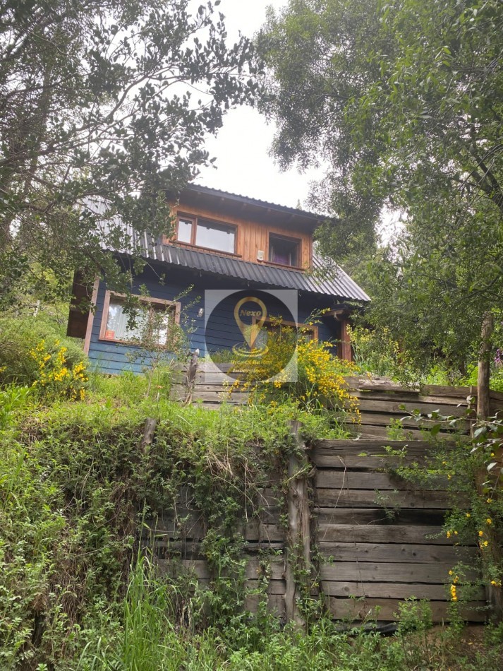 CASA EN LADERA NORTE